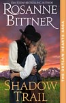 Book cover showing cowboy embracing a blonde woman